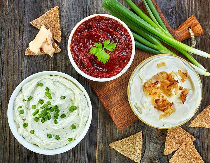 Assorted dipping sauces in bowls, illustrating savory dressings and dips applications